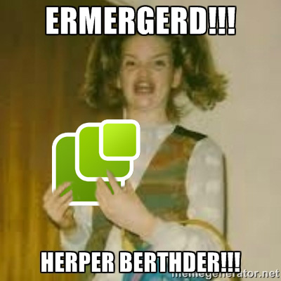 ERMERGERD!!! (excited girl holding a large microformats logo) HERPER BERTHDER!!!